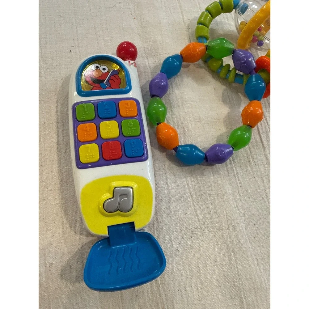 Sesame Street Elmo Flip Phone Toy and Colorful Bead Rattle Set Multi Color